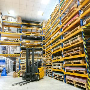 a large warehouse filled with lots of pallets